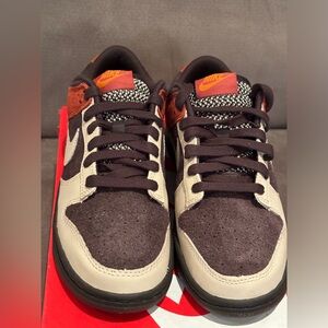 Nike Dunk Low “Red Panda”